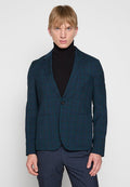 Herrenblazer in dunklem Teal mit einem karierten Muster in Marineblau und Grün. Verfügt über einen einzelnen Knopf, Revers und zwei Fronttaschen.