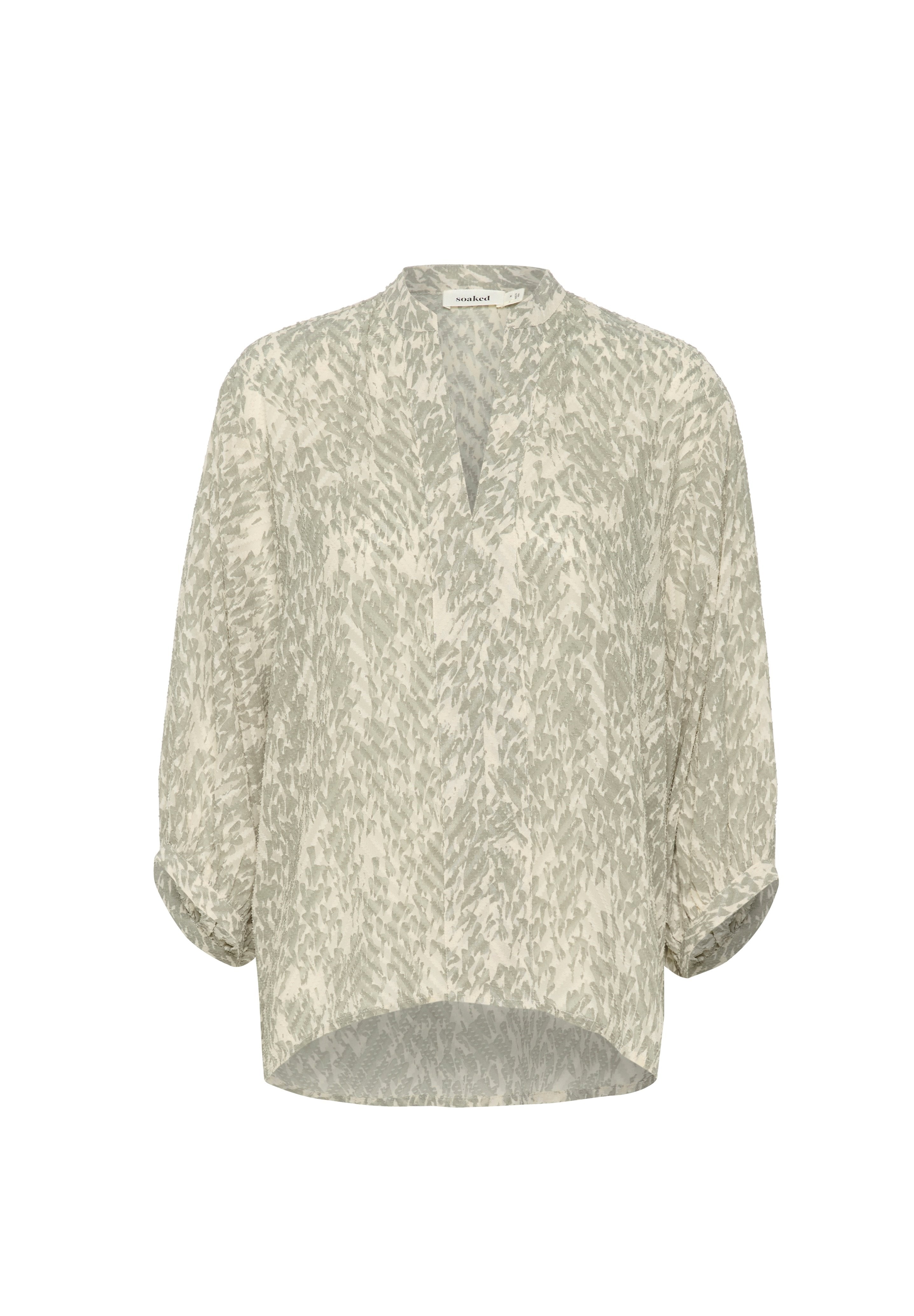 Leichte, beige Bluse mit einem subtilen grauen abstrakten Muster, V-Ausschnitt, Dreiviertelärmel und abgerundetem Saum. Weicher, strukturierter Stoff.
