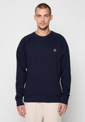 Marineblaue Sweatshirt mit geripptem Rundhalsausschnitt und Bündchen. Verfügt über Raglanärmel und ein kleines Logodetail auf der Brust. Weicher, strukturierten Stoff.