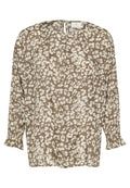 Braune Bluse mit weißem Blumenmuster, langen Ärmeln und gerafften Bündchen. Verfügt über einen Schlüsselaußenschluss am Rücken und einen lockeren, entspannten Schnitt.