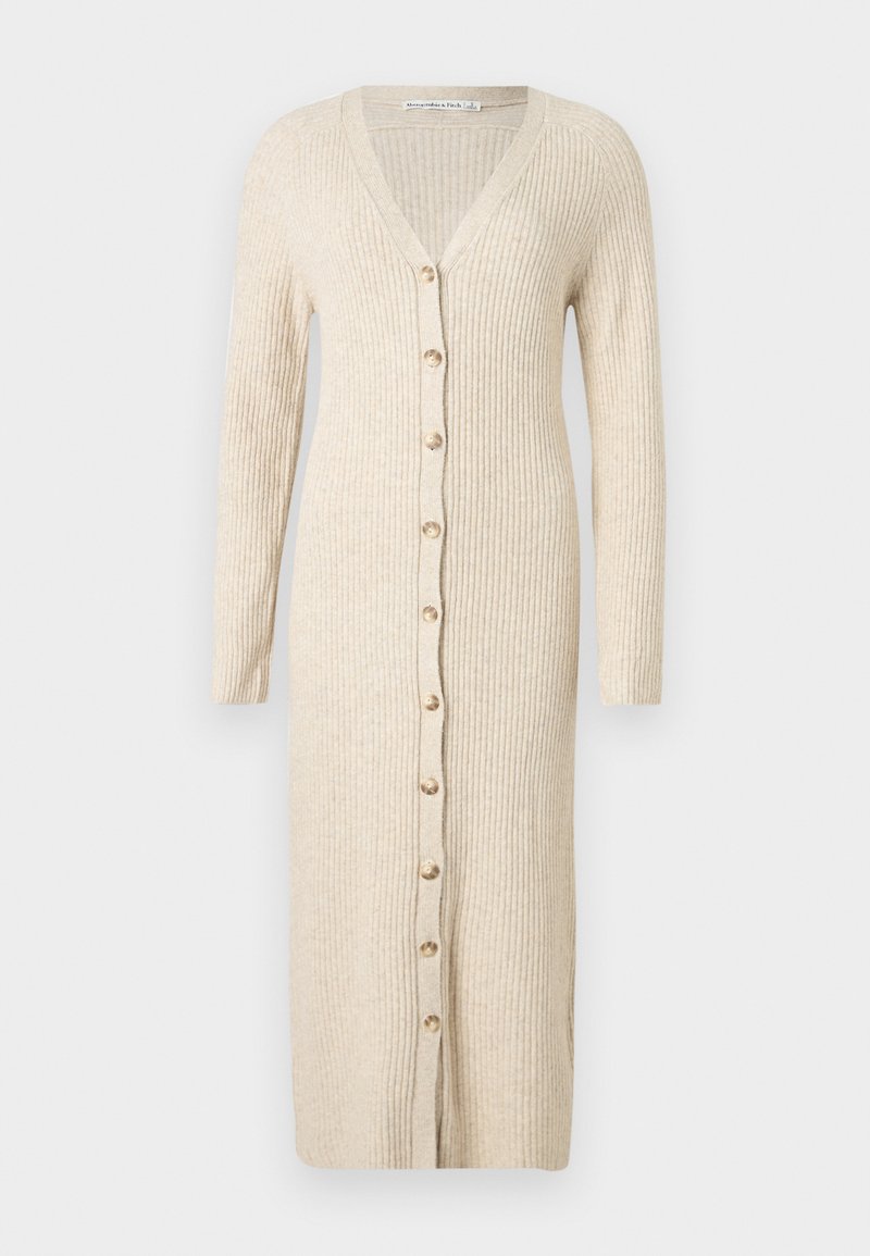 Beiges, geripptes, langes Strickjackenkleid mit langen Ärmeln und einer durchgehenden Vorderknopfleiste.