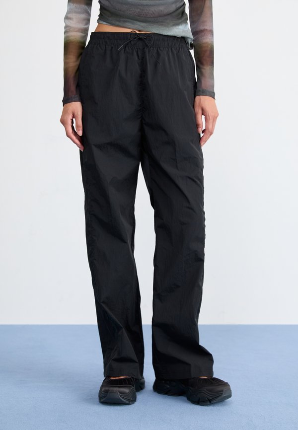 Nike Sportswear PANT - Tracksuit bottoms - black