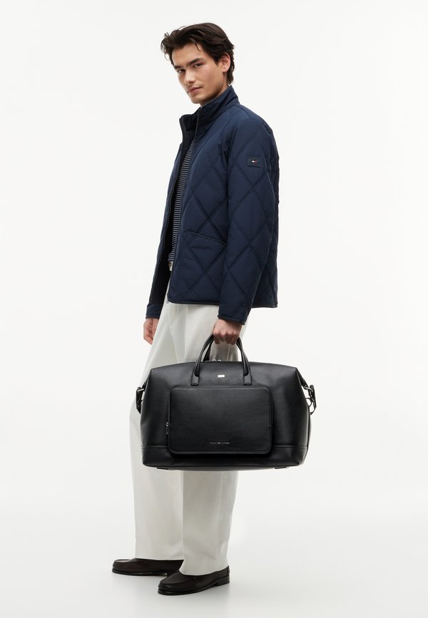 Tommy Hilfiger CENTRAL DUFFLE UNISEX - Weekend bag - black