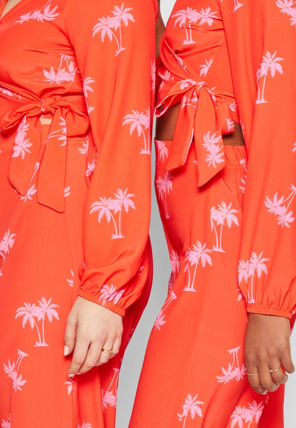 Never Fully Dressed NFDXZLND RORY PALM WRAP TOP