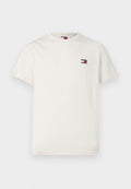 Kurzarm, cremefarbenes T-Shirt aus weichem Material. Verfügt über ein kleines, mehrfarbiges Logo auf der linken Brust. Klassischer Rundhalsausschnitt.