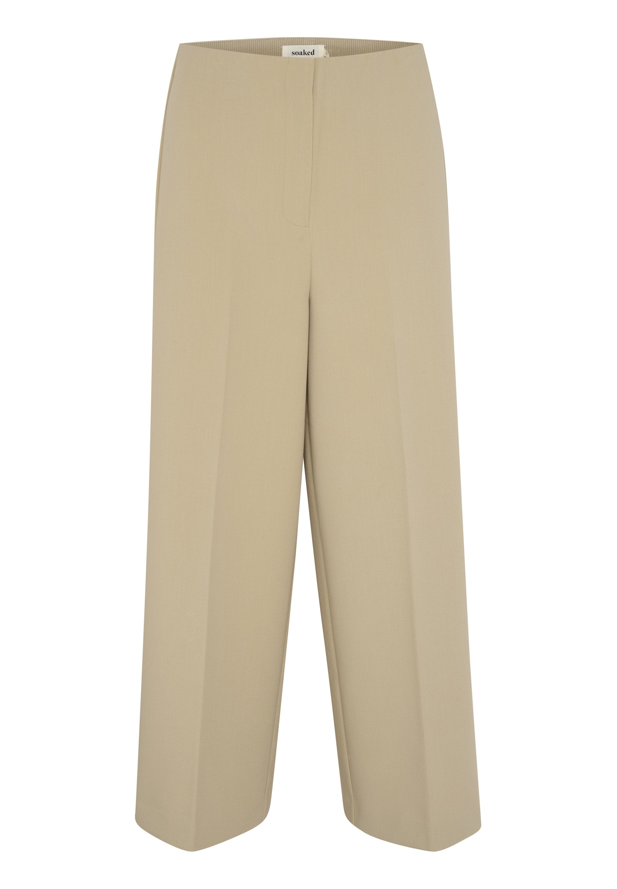 Beige weit geschnittene Hose mit glatter Textur, ausgestattet mit einem flachen Frontbund und ohne sichtbare Verschlüsse. Der Stoff hat einen weichen Fall.