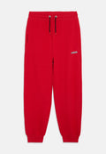 Rote Trainingshosen aus weichem Stoff, mit einem elastischen Bund und Zugband, Seitentaschen und einem kleinen Logo am Oberschenkel.