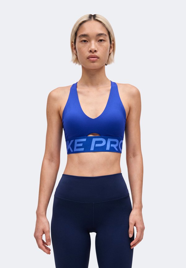Nike Performance SCULPT BRA - Medium support sports bra - old royal/white