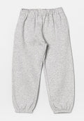 Graue Jogginghosen aus weichem, strukturiertem Stoff. Mit einem elastischen Bund und elastischen Bündchen an den Knöcheln. Lässiger, lockerer Schnitt.