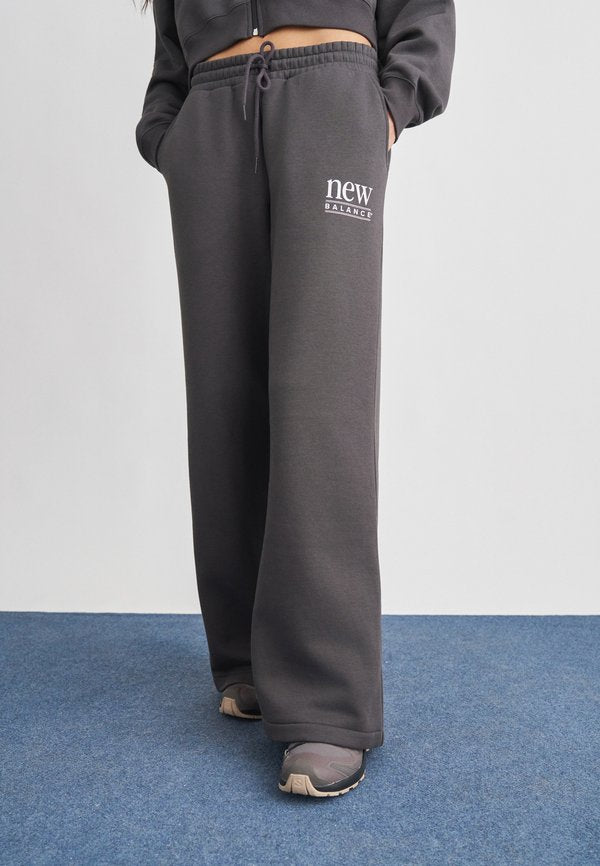New Balance REIMAGINED - Tracksuit bottoms - antrachite