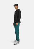 Under Armour UNSTOPPABLE - Tracksuit bottoms - rack green