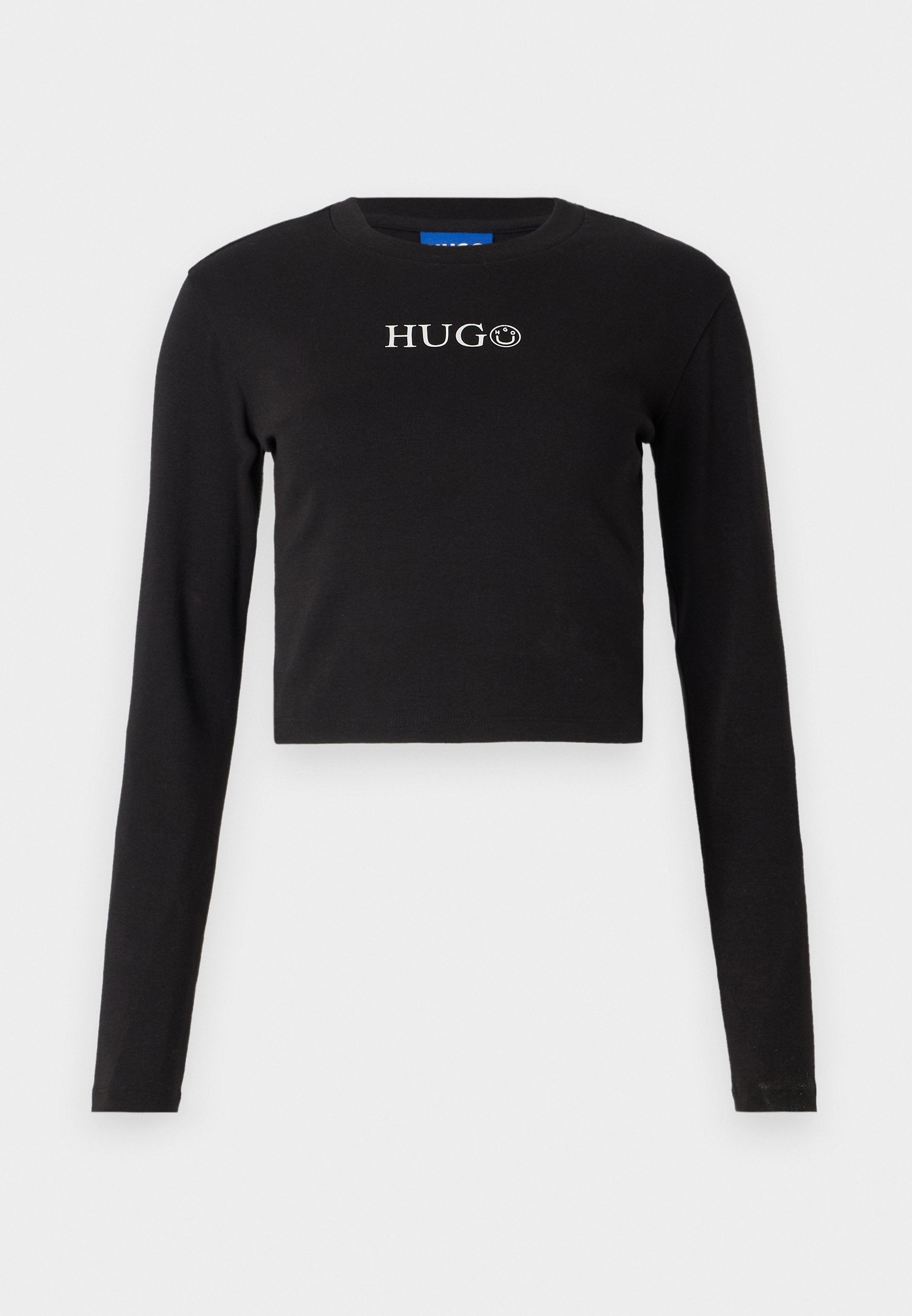 Schwarzes, kurz geschnittenes Langarmshirt aus Baumwolle mit Rundhalsausschnitt und einem weißen Logo auf der Vorderseite, das ein lächelndes Gesicht zeigt.