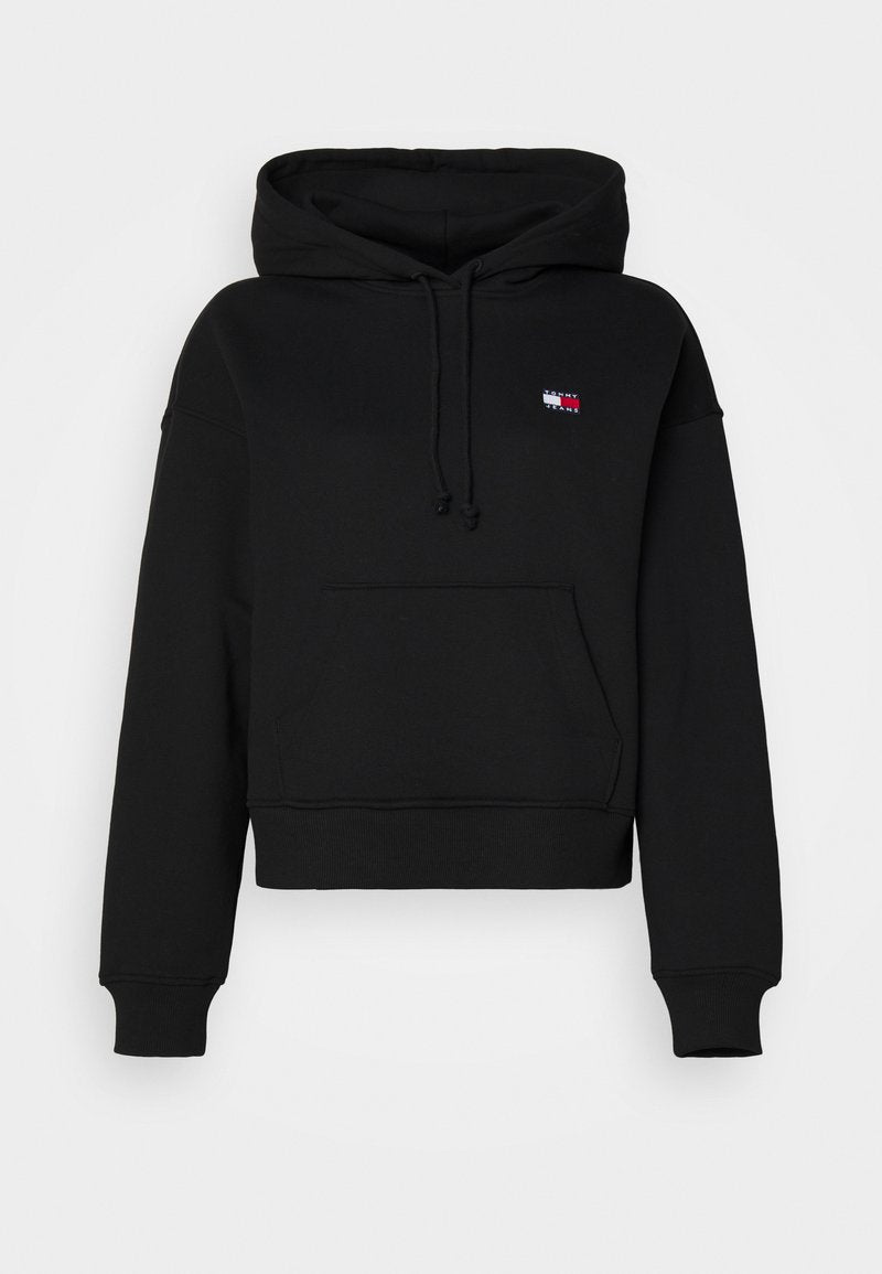 Schwarze, kurze Kapuzenjacke aus weichem Stoff mit einer Fronttasche. Verfügt über eine Kordelzugkapuze und einem kleinen Logo-Patch auf der oberen linken Seite.