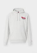 Grauer Kapuzenpullover mit Kordeln, Fronttasche und rotem "Tommy Jeans, N.Y." Logo. Weicher Stoff und gerippte Bündchen an den Ärmeln und dem Saum.