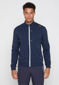 Marineblaue Zip-Up-Sweatjacke mit hohem Kragen, strukturiertem Stoff, Front-Reißverschlusstasche und reflektierenden Akzenten an den Nähten und dem Reißverschluss.
