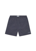 Marineblaue Shorts mit einem geometrischen Muster aus roten und blauen Kreisen. Elastischer Bund mit einem kleinen Logo-Patch unten rechts. Leichtes Material.