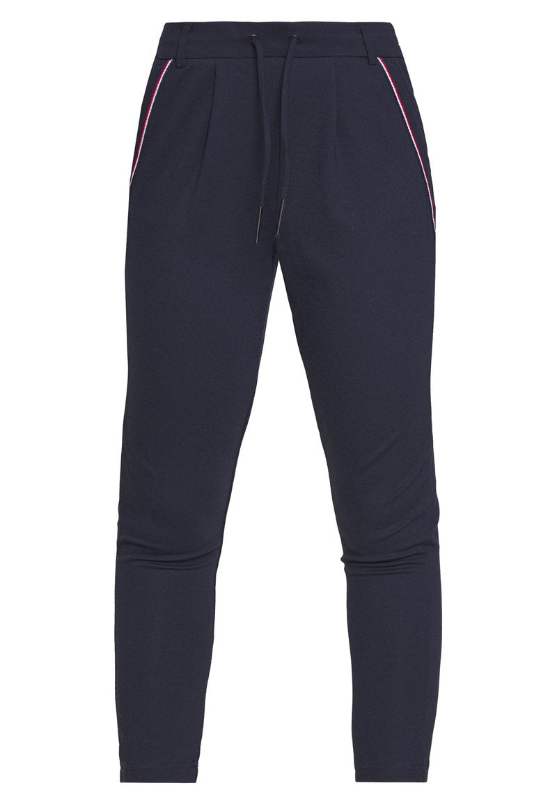 Marineblaue Jogginghosen aus weichem Material, mit seitlichen Taschen und pink-weißem Piping sowie einem Kordelzug für eine anpassbare Passform.
