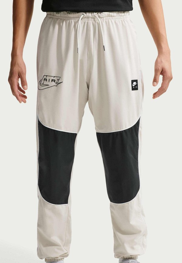 Nike Sportswear HYBRID UTILITY AIR - Trousers - light bone black white