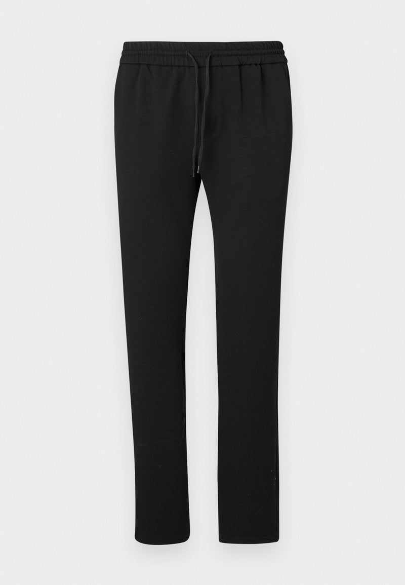 Schwarze Jogginghosen mit elastischem Bund und Zugband. Hergestellt aus weichem Stoff, mit einem schmal zulaufenden Bein und minimalistischen Details.