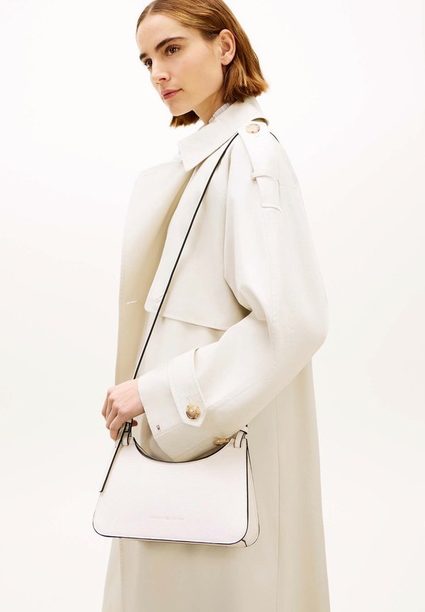 Tommy Hilfiger TH MODERN CROSSOVER - Cross body bag - soft cream
