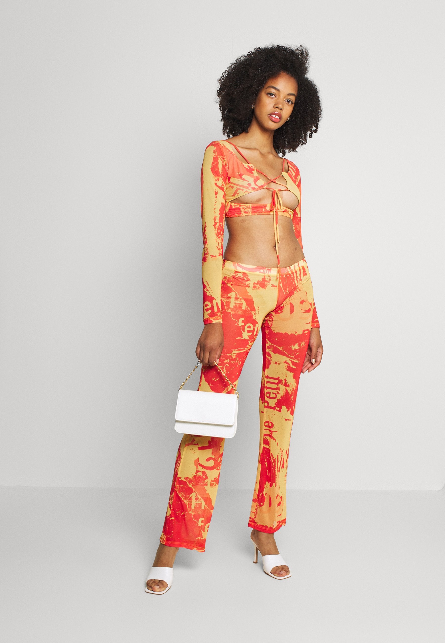 Jaded London BOOTCUT TROUSER TONAL MAGAZINE PRINT