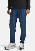 Under Armour UNSTOPPABLE - Tracksuit bottoms - wham blue