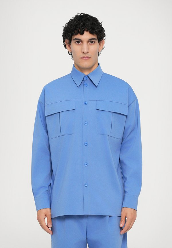 Essential Collective DOUBLE POCKET SHIRT