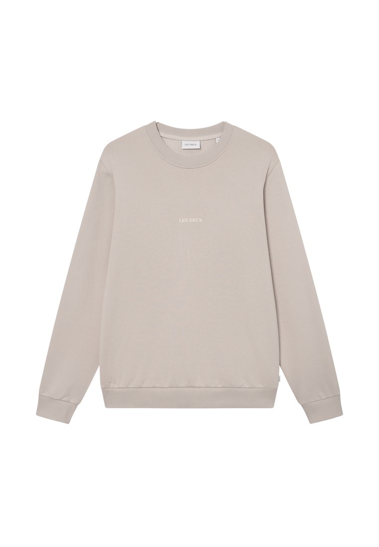Helle beiger Sweatshirt mit rundem Halsausschnitt und langen Ärmeln. Verfügt über einen gerippten Saum und Ärmelabschlüsse, mit dem in Weiß gestickten "LES DEUX" Logo.