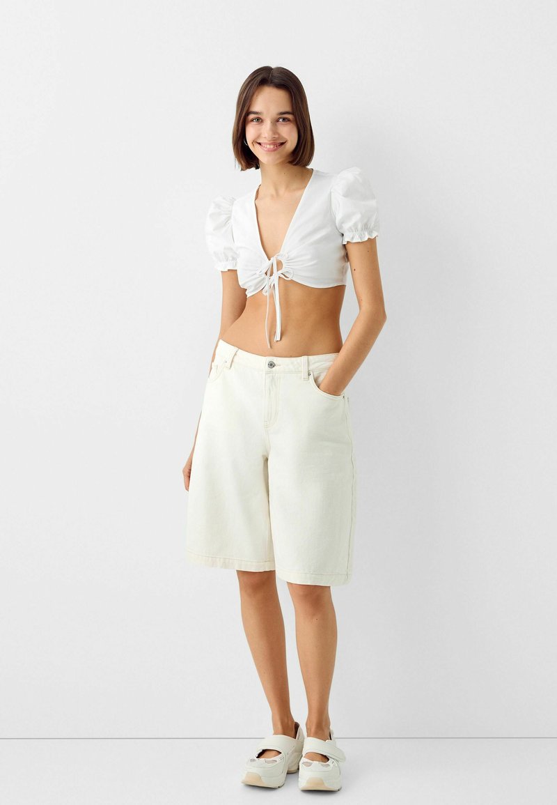 TIED SHORT SLEEVE Media 1