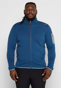 Blauer Reißverschlussjacke mit horizontaler Rippstruktur, orangefarbenem Reißverschluss, Taschen an den Seiten und einer Tasche am Oberarm mit einem orangefarbenen Akzent.