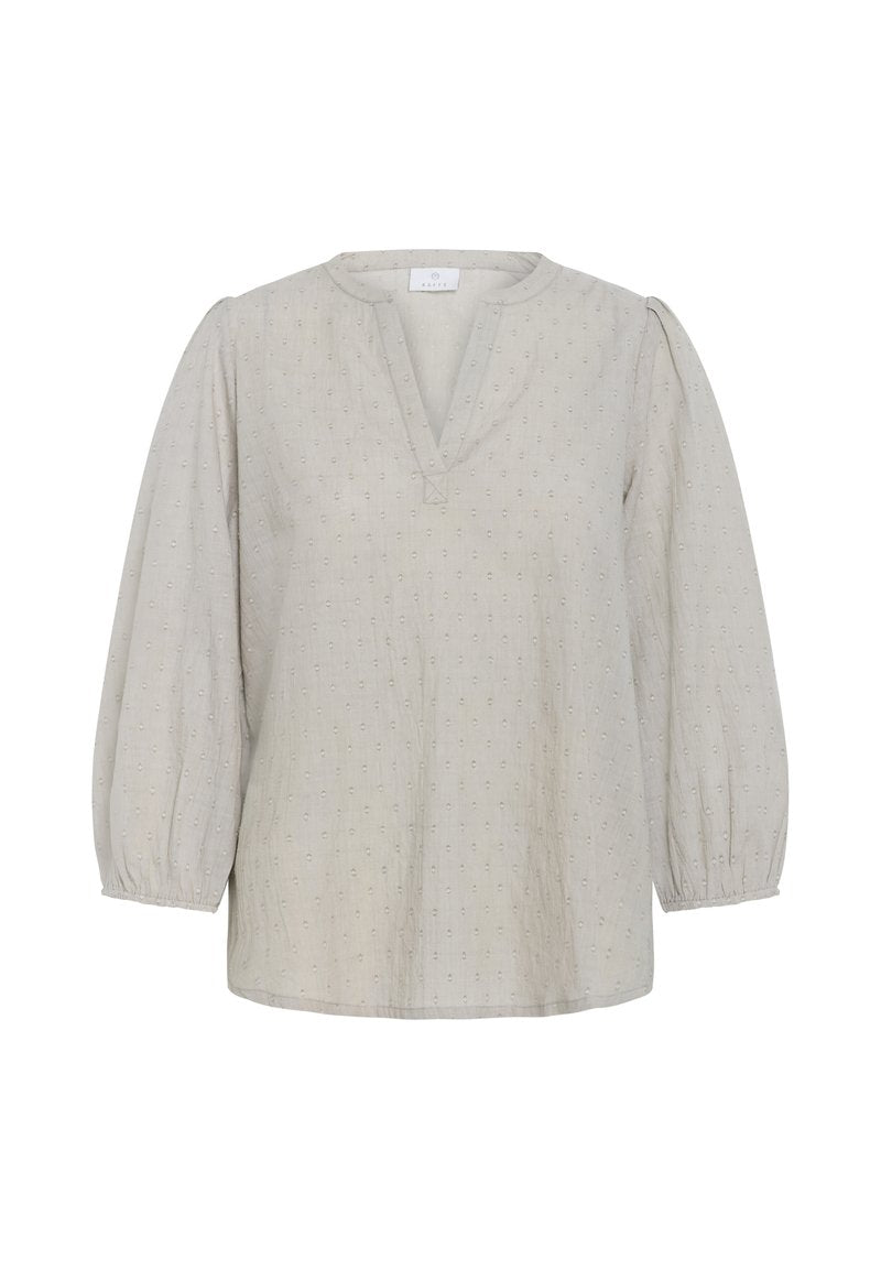 Hellgraue Bluse mit V-Ausschnitt, strukturierten Polka-Dots und Puffärmeln. Verfügt über geraffte Bündchen und einen lockeren Schnitt für mehr Komfort.