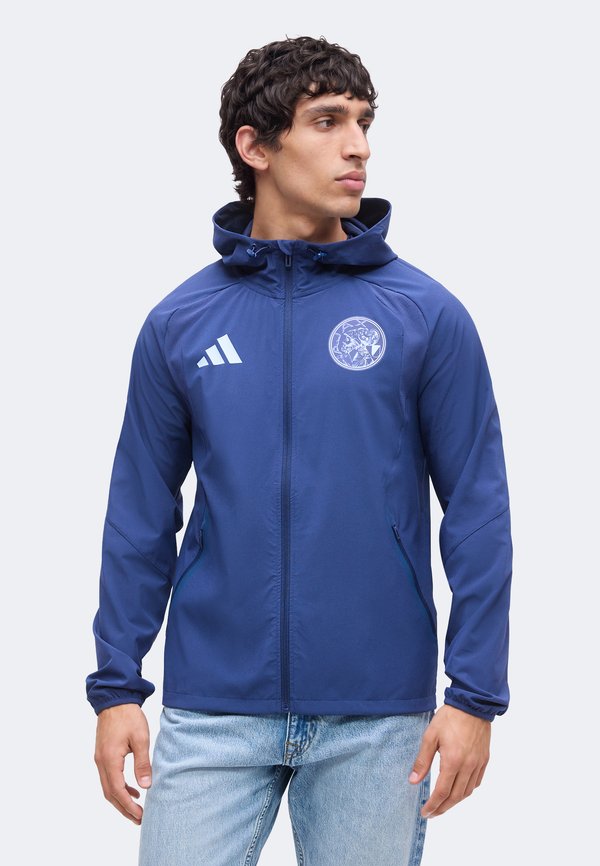adidas Performance AJAX AMSTERDAM TIRO TRAVEL FULL ZIP - Club wear - tech indigo