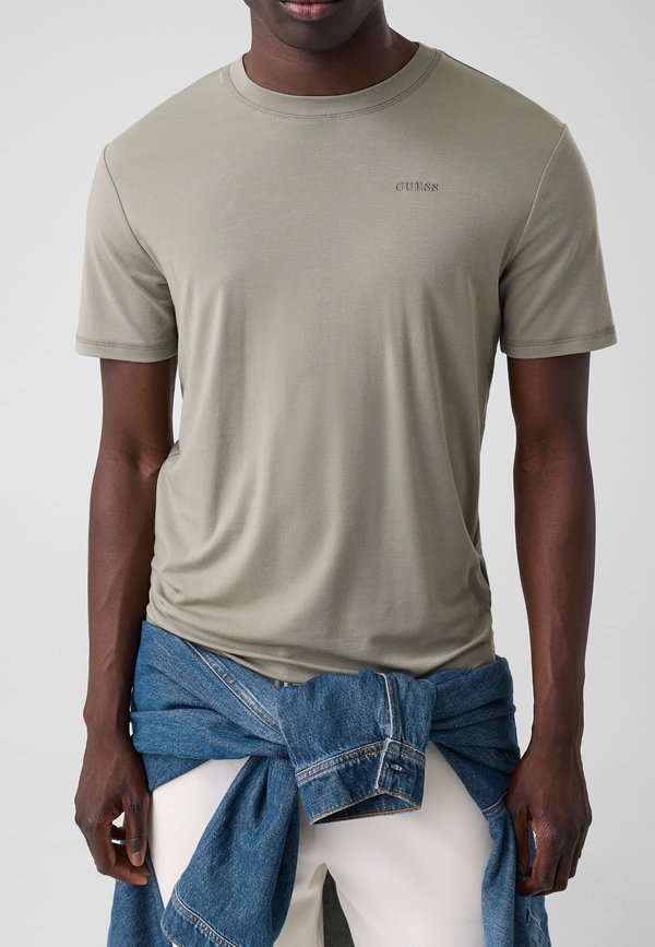 Guess BESTICKTES LOGO-T-SHIRT - Basic T-shirt - grün