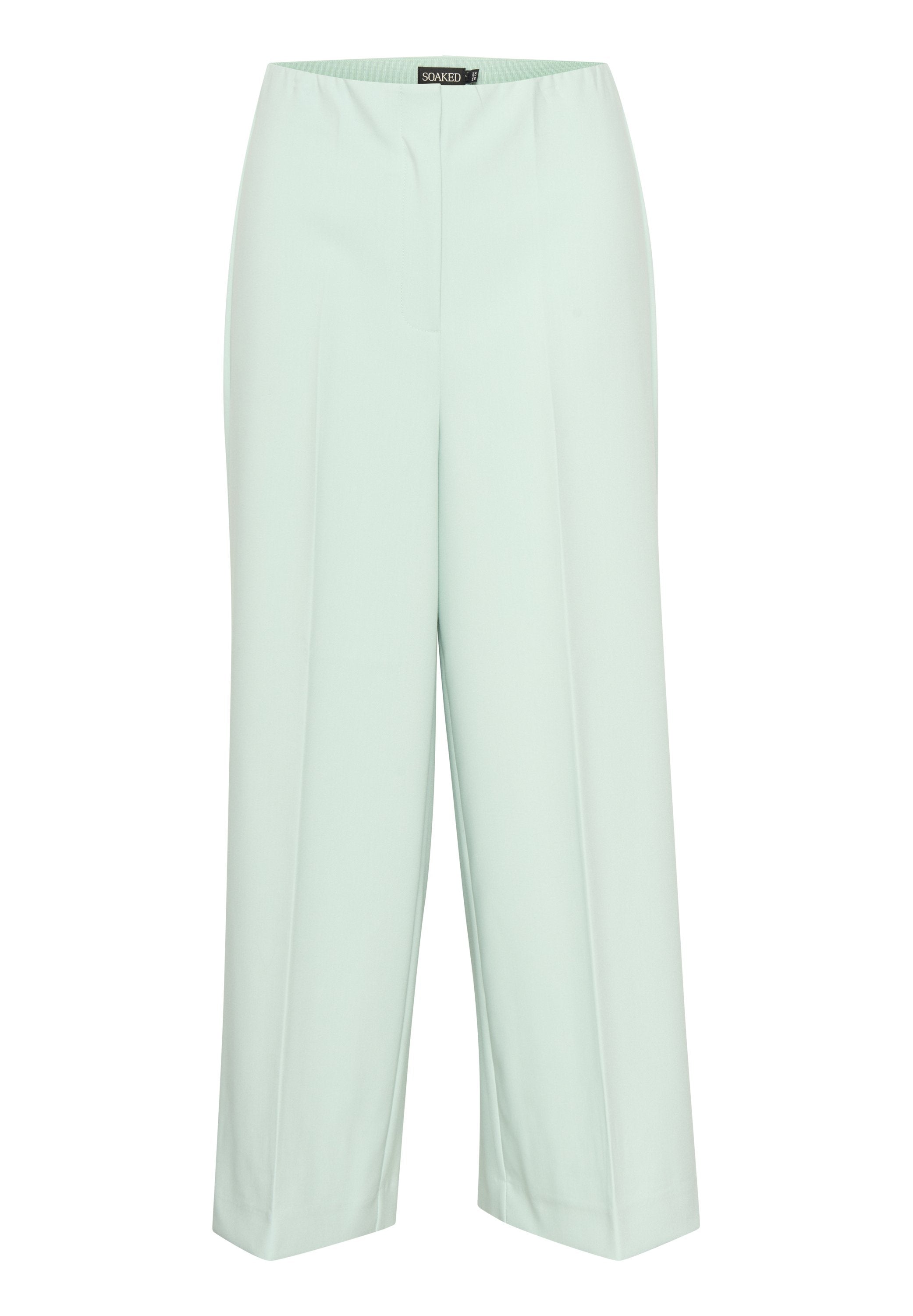 Helle mintgrüne weit geschnittene Hose aus glattem Stoff, mit hohem Bund und vorderen Falten für eine elegante Silhouette.