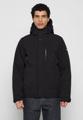 Schwarze Kapuzenjacke mit Reißverschlusstasche auf der Brust, zwei Seitentaschen und einer glatten, matten Oberfläche. Verfügt über eine lockere Passform und elastische Bündchen.