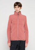 Rosa Fleecjacke mit hohem Kragen, die ein geometrisches Muster auf der Brust, Reißverschlusstaschen und eine weiche Textur aufweist.