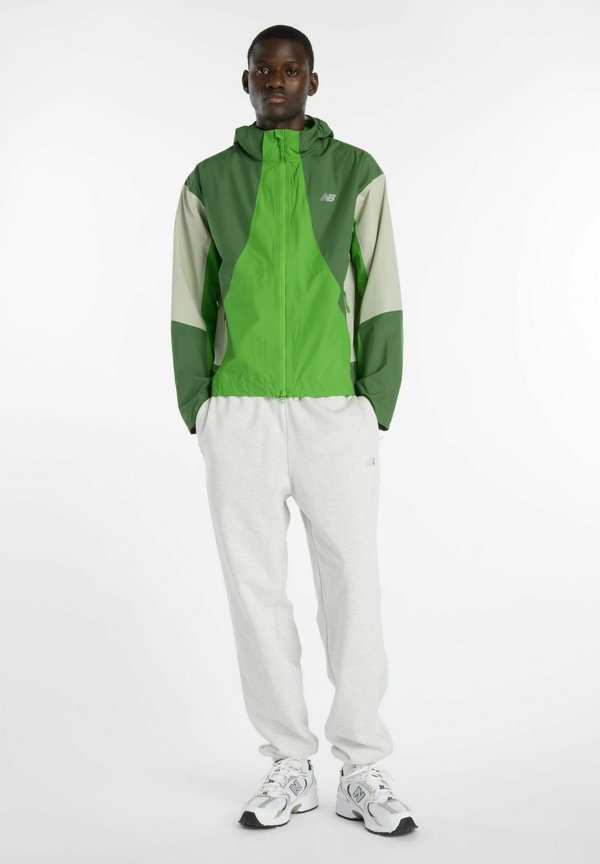 New Balance BETTER RUN - Waterproof jacket - dark alpine green