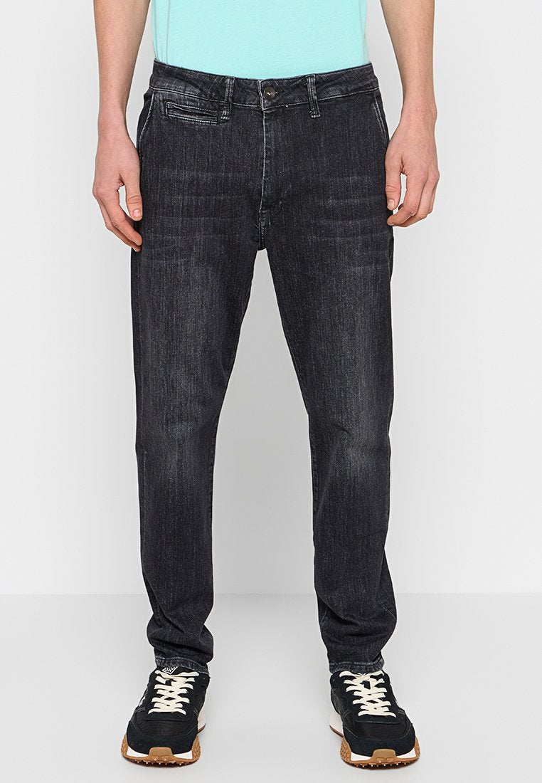 Ausgebleichte schwarze Denim-Jeans mit geradem Schnitt. Verfügt über einen Knopfverschluss, fünf Taschen und dezente Waschungen an der Vorderseite.