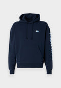 Dunkelblaues Hoodie aus Baumwolle, mit einer Vordertasche, verstellbarem Kordelzug und "TOMMY JEANS" in Weiß auf dem Ärmel bedruckt.