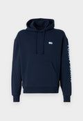 Dunkelblaues Hoodie aus Baumwolle, mit einer Vordertasche, verstellbarem Kordelzug und "TOMMY JEANS" in Weiß auf dem Ärmel bedruckt.