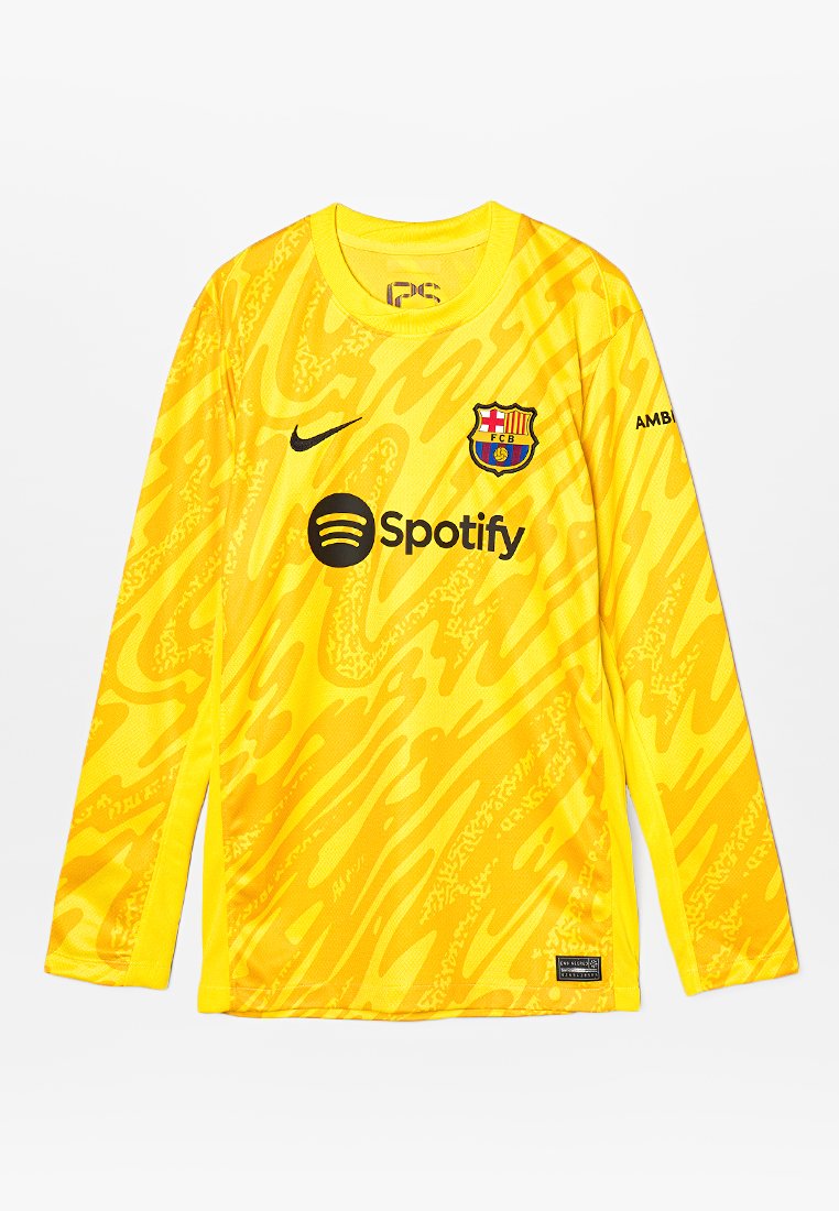 Gelbes Langarm-Fußballtrikot mit einem strukturierten, abstrakten Muster, einem schwarzen Nike-Logo und dem Barcelona-Abzeichen sowie dem Spotify-Logo auf der Brust.