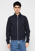 Marineblaue Jacke mit Reißverschluss, Kragen, zwei Fronttaschen, strukturierter Stoff und gerippte Bündchen. Legere Passform mit geradem Schnitt.
