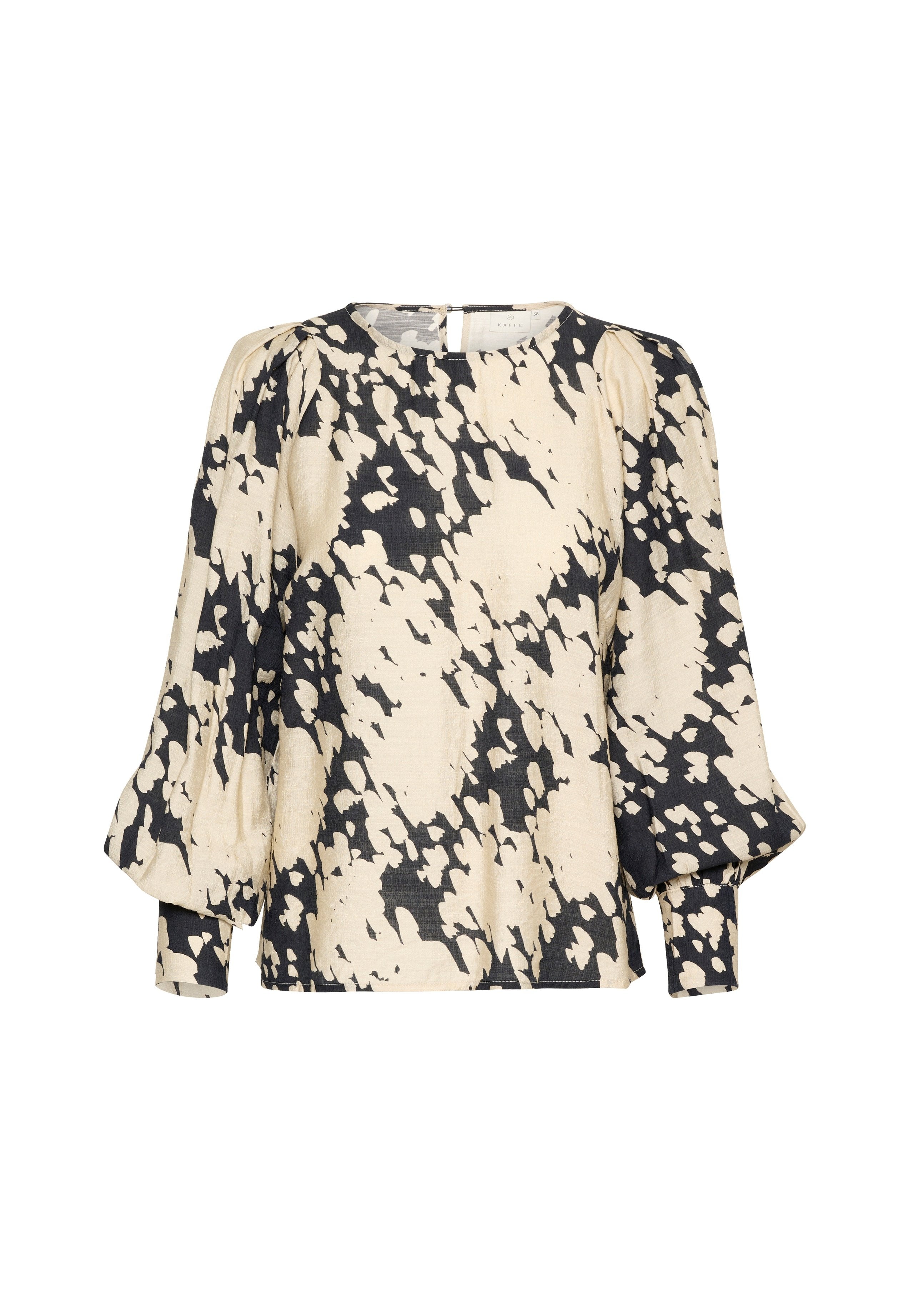 Luftige, cremefarbene Bluse mit schwarzem abstraktem Print. Verfügt über geraffte lange Ärmel und einen runden Halsausschnitt. Strukturstoff mit leichtem Glanz.