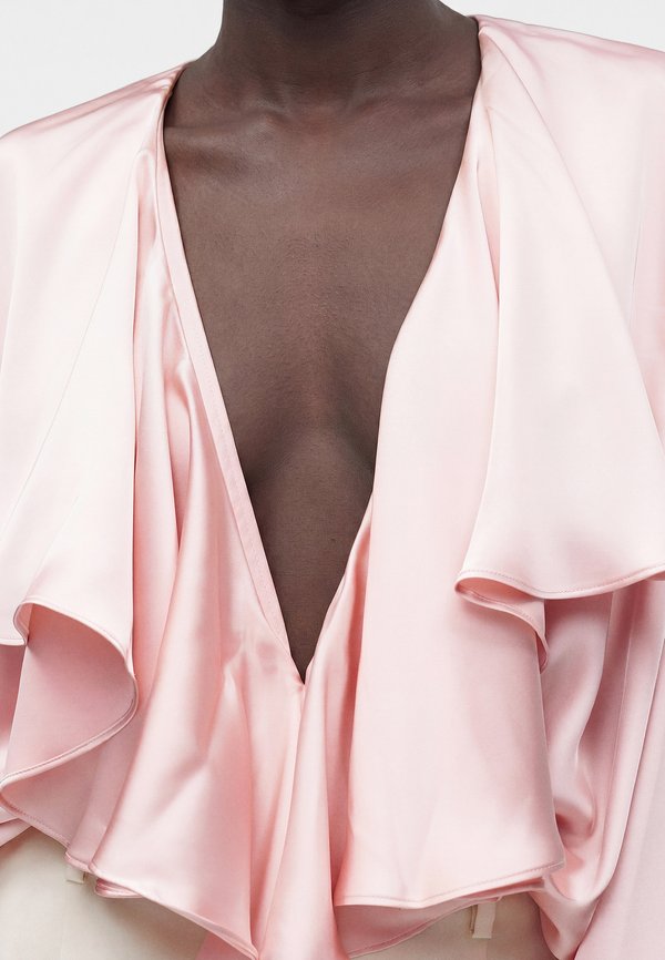 Norma Kamali LONG SLEEVE DEEP V RUFFLE BODYSUIT