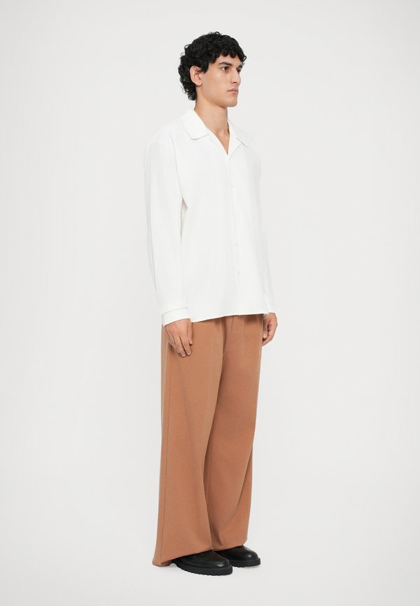 Essential Collective SHIRT