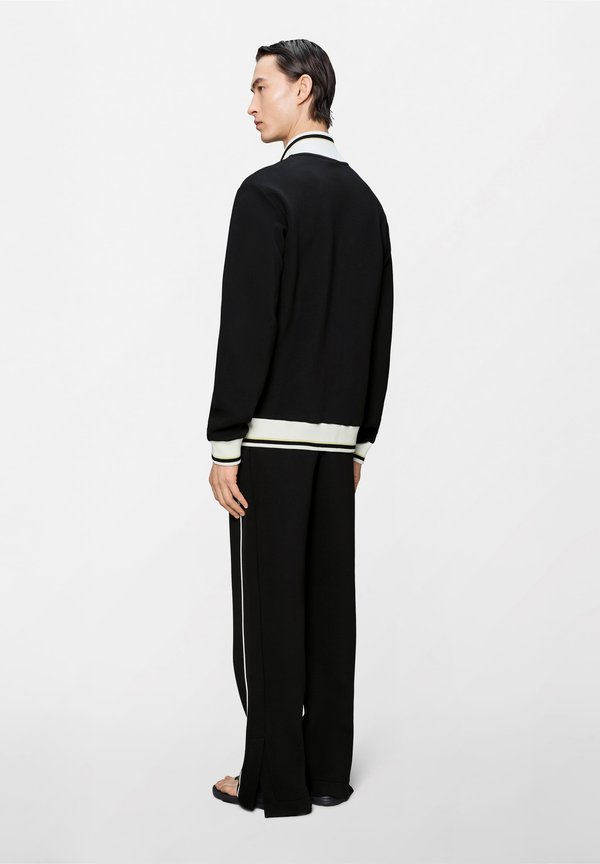 Rains DOWNTIME UNISEX