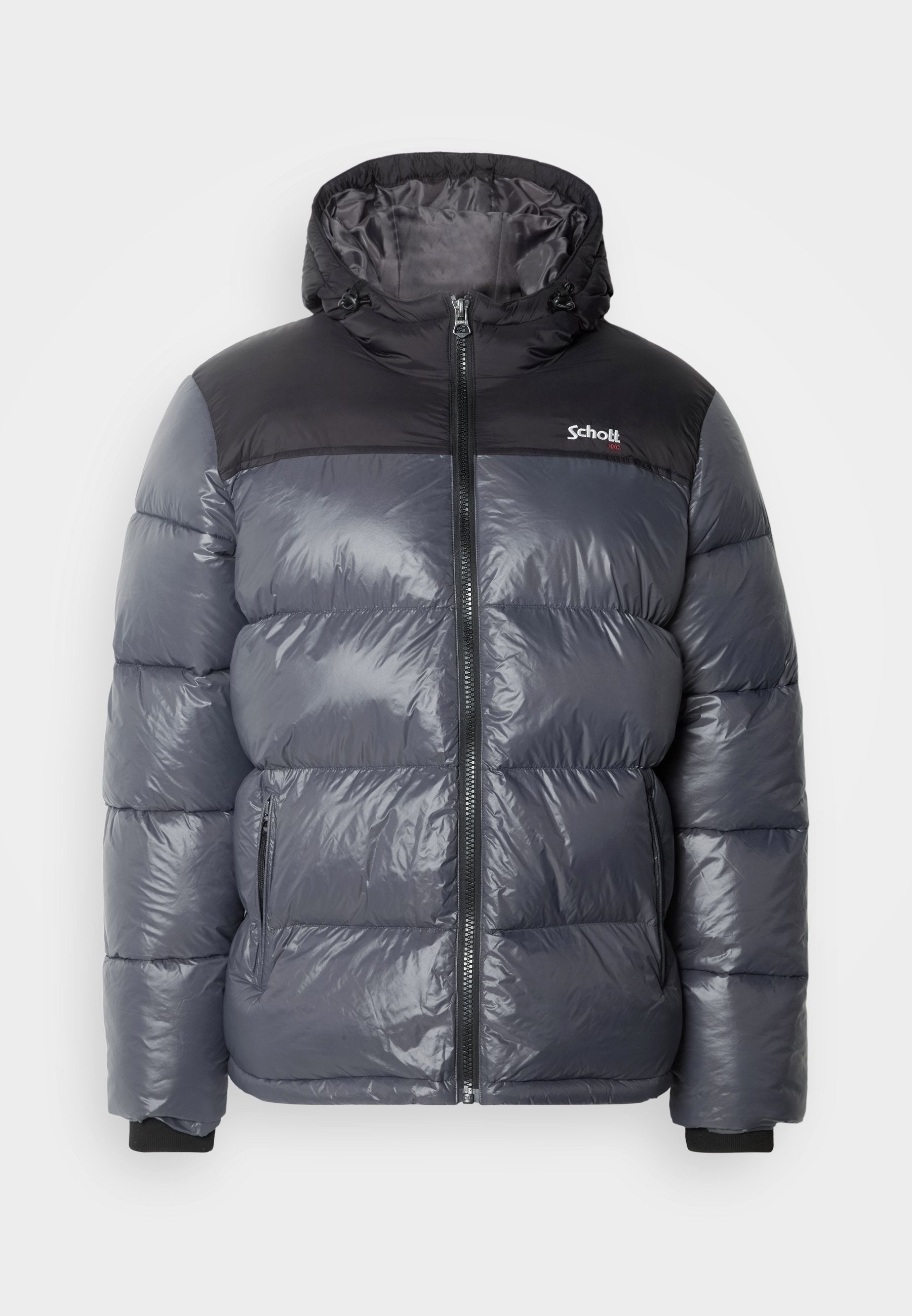 Graue Steppjacke mit einem schwarzen oberen Bereich, ausgestattet mit Kapuze, Frontreißverschluss, Seitentaschen und elastischen Bündchen. Glänzendes, leichtes Material.