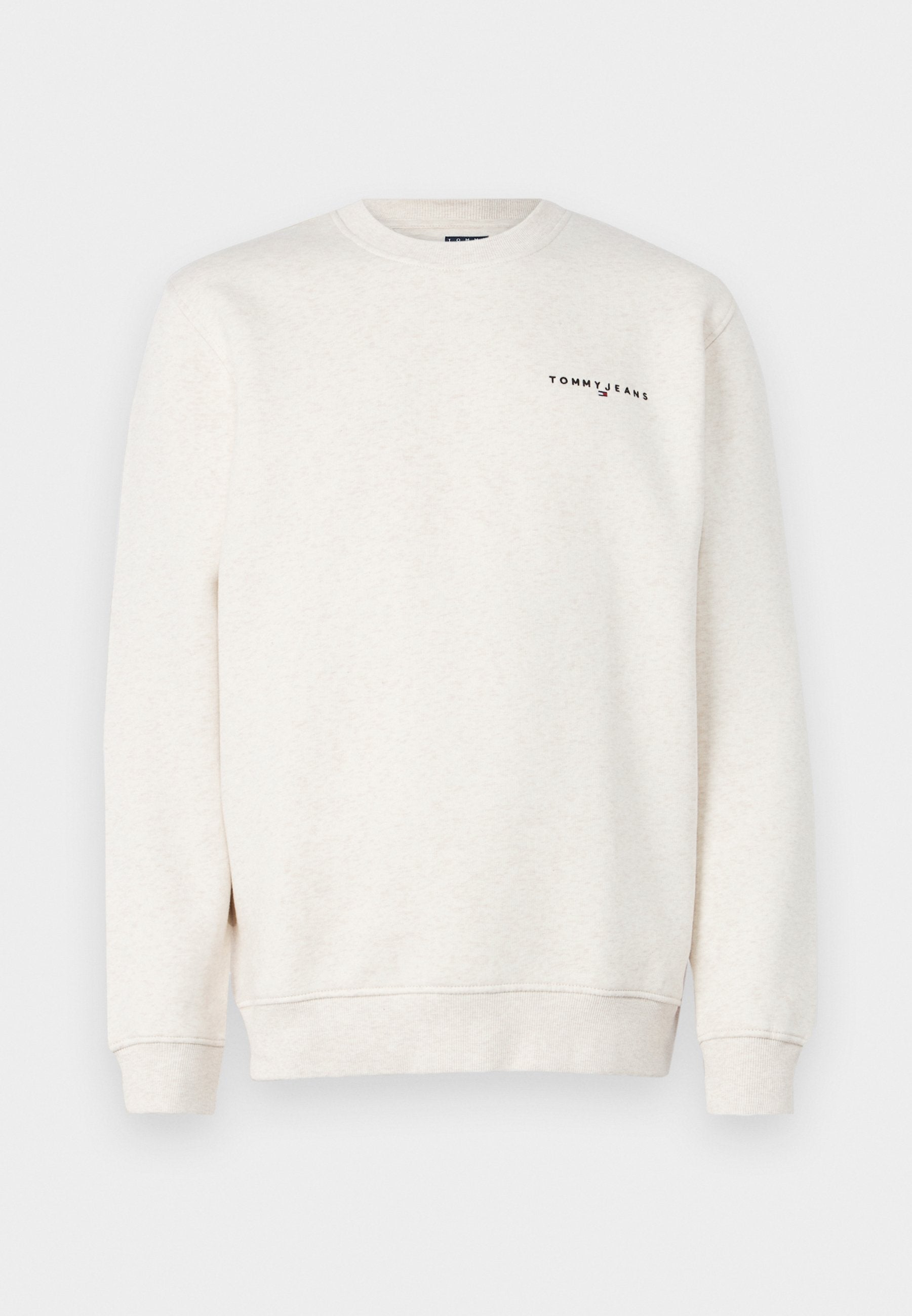 Hellbeige Sweatshirt aus weichem Material, mit Rundhalsausschnitt und gerippten Bündchen. Auf der Brust befindet sich das schwarze "TOMMY JEANS" Logo.