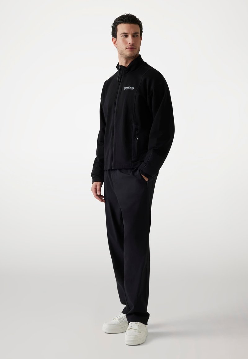 Guess Trainingsjacke Media 1