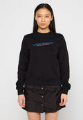 Schwarzer Sweatshirt mit Rundhalsausschnitt, langen Ärmeln und gerippten Bündchen. Mit "Diesel Industry"-Logo in Blau und Rot auf der Brust.